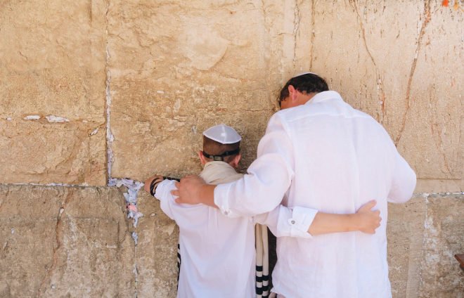 Father and his bar mitzva son at the westren wall
