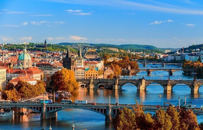 Appreciate the beauty of Prague from the stunning waterfront of the Vlatava River.