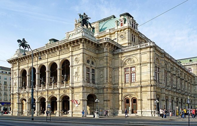 Experience the Vienna State Opera, with its luxurious hall, beautifully dressed guests, and the symphony orchestra’s flawless music.