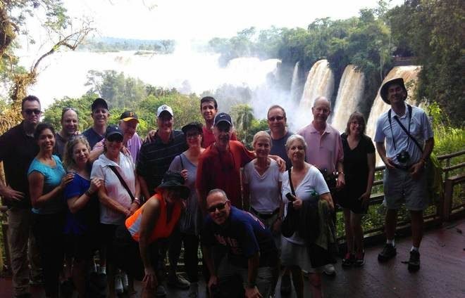 Group with falls in background