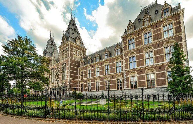 Explore Amsterdam’s must-see museums: The Rijksmuseum, displaying Rembrandt’s masterpiece The Night Watch and Vermeer’s famous The Milkmaid, and the Van Gogh museum, which houses the world's largest collection of artworks by Vincent van Gogh, including Sunflowers, Almond Blossom, and The Potato Eaters.