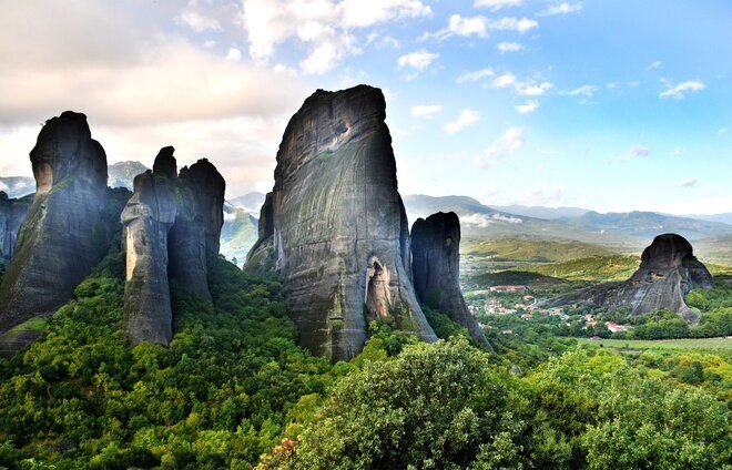 Drive to the region of Meteora, one of the largest and most important complexes of Eastern Orthodox monasteries in Greece. A series of six monasteries sit high above the valley, carved into the natural sandstone.