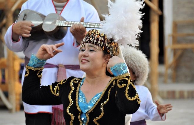 Soak up the local culture at a performance of Uzbekistani song and dance, with dinner.