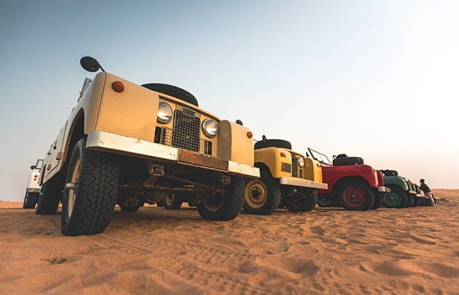 Traverse the desert in museum-quality 1950's vintage Land Rovers. Spot native wildlife like Arabian oryx on a desert drive in the Dubai Desert Conservation Reserve.